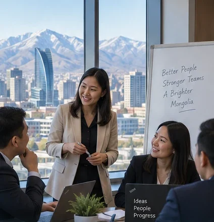 Facilitator leading a workplace skills session in an office overlooking Ulaanbaatar